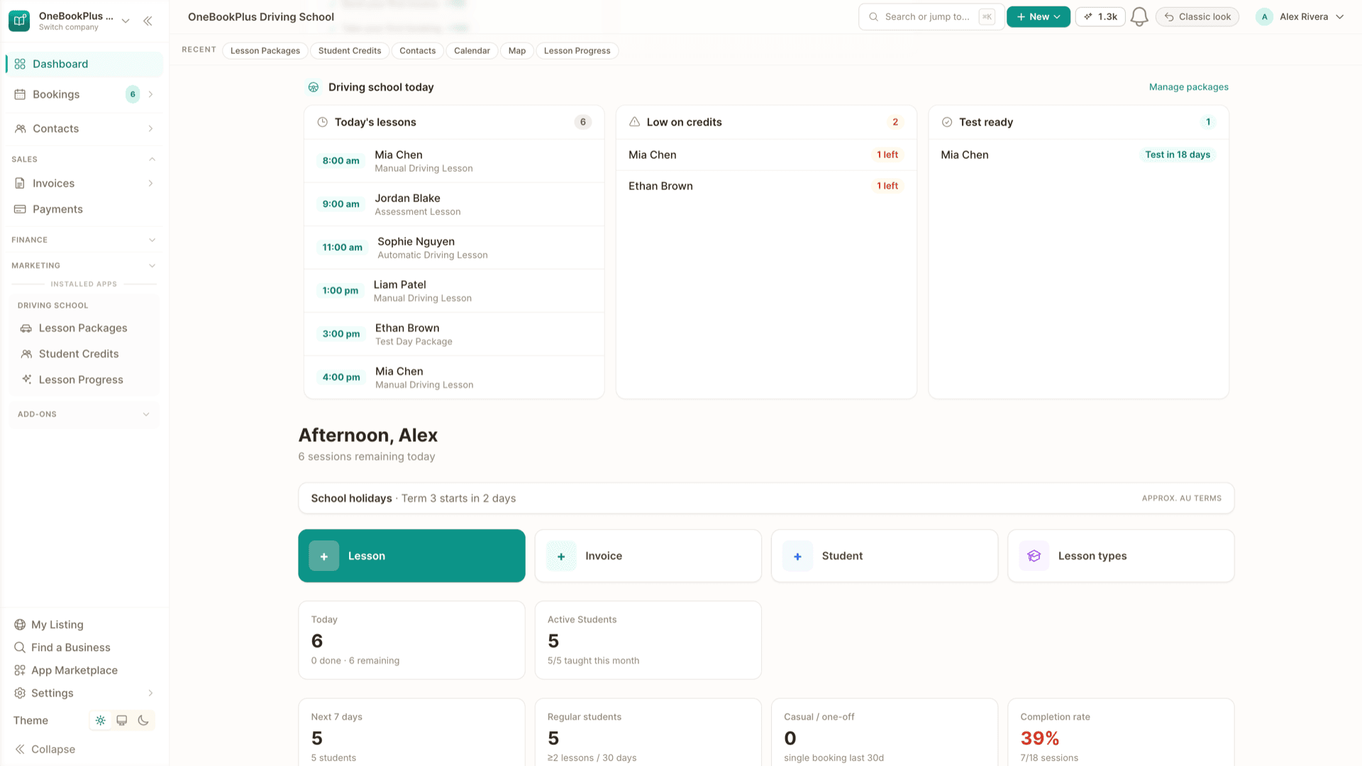 The driving-school dashboard in OneBookPlus on a laptop