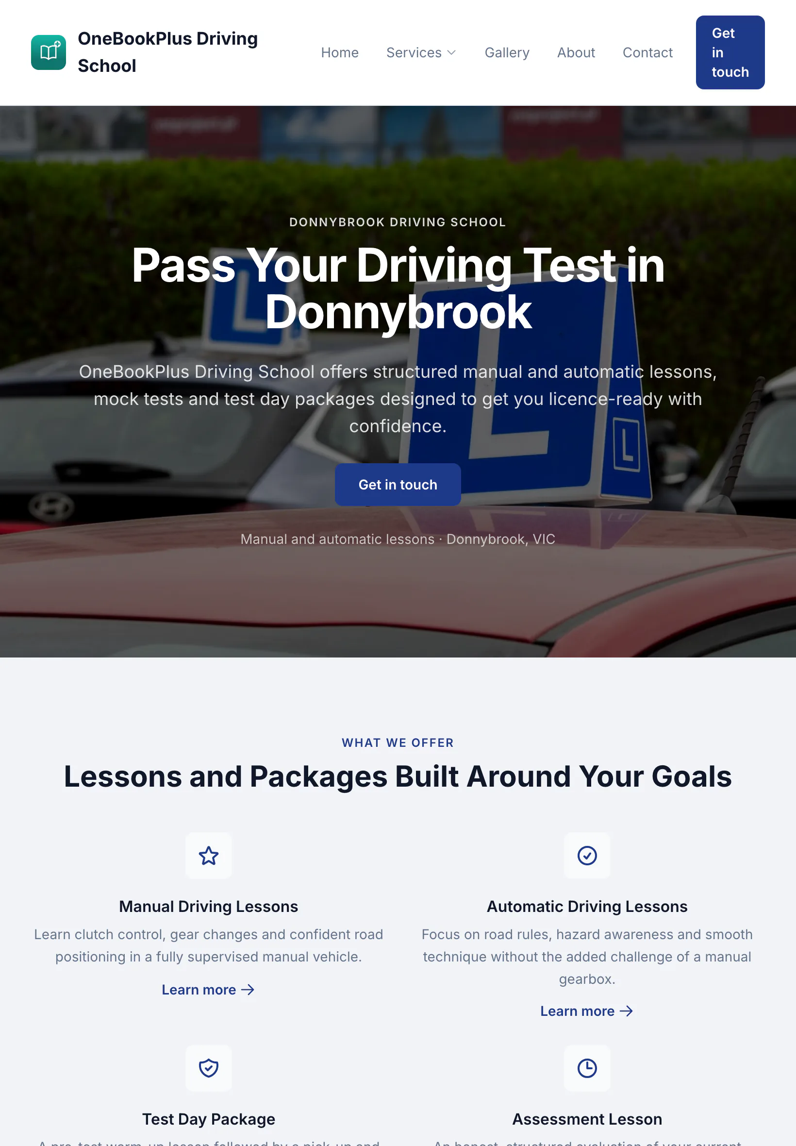The OneBookPlus Driving School home page on a tablet: the logo and name over two lines at the left, the menu across the middle, the L plates hero, and four lesson cards two across