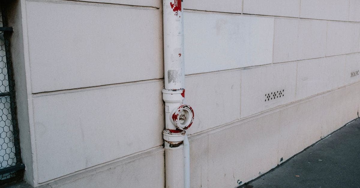 Burst copper pipe repair in a Sydney terrace house wall cavity